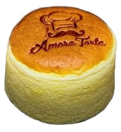 A whole Amore Torta Japanese cheesecake, faintly trembling.